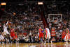 MIAMI, FL - JANUARY 21: LeBron James #6 of the Miami Heat shoots over Evan Turner #12 of the Philadelphia 76ers during a game at American Airlines Arena on January 21, 2012 in Miami, Florida. NOTE TO USER: User expressly acknowledges and agrees that, by downloading and/or using this Photograph, User is consenting to the terms and conditions of the Getty Images License Agreement.  (Photo by Mike Ehrmann/Getty Images)