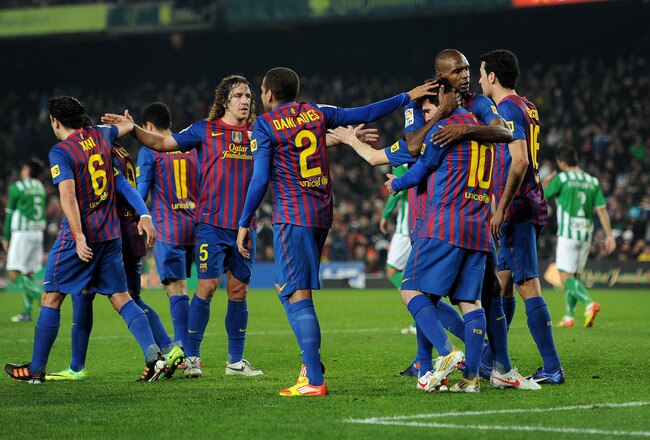BARCELONA, SPAIN - JANUARY 15:  Lionel Messi (3rd R) of FC Barcelona celebrates with his teammates after scoring from the penalty spot during the la Liga match between FC Barcelona and Real Betis Balompie at the Camp Nou stadium on January 15, 2012 in Barcelona, Spain.  (Photo by Jasper Juinen/Getty Images)