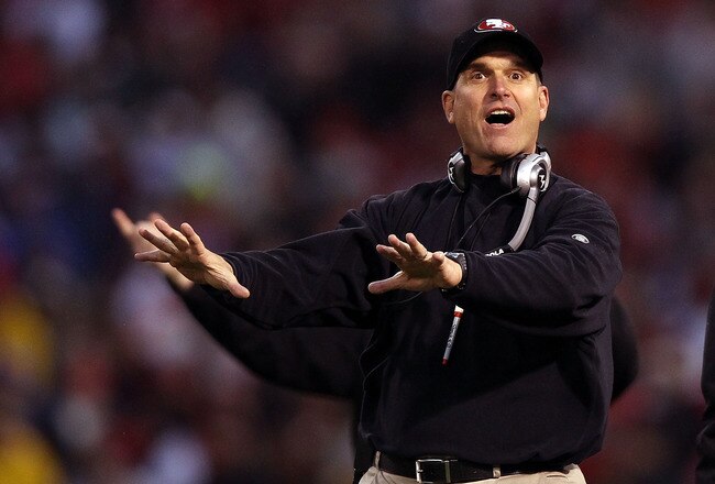 SAN FRANCISCO, CA - JANUARY 22:  Head coach Jim Harbaugh of the San Francisco 49ers gestures during the NFC Championship Game against the New York Giants at Candlestick Park on January 22, 2012 in San Francisco, California.  (Photo by Ezra Shaw/Getty Images)