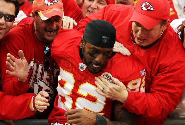 KANSAS CITY, MO - DECEMBER 18:  Dwayne Bowe #82 of the Kansas City Chiefs celebrates by jumping into the standfs after the Chiefs defeated the Green Bay Packers 19-14 to win the game on December 18, 2011 at Arrowhead Stadium in Kansas City, Missouri.  (Photo by Jamie Squire/Getty Images)