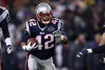 FOXBORO, MA - JANUARY 14:  BenJarvus Green-Ellis #42 of the New England Patriots runs the ball against the Denver Broncos during their AFC Divisional Playoff Game at Gillette Stadium on January 14, 2012 in Foxboro, Massachusetts.  (Photo by Elsa/Getty Images)