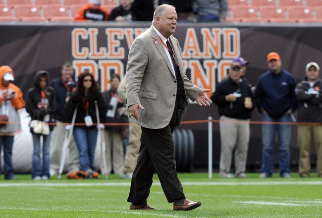 CLEVELAND, OH - OCTOBER 2:  Cleveland Browns president Mike Holmgren greets people on the field prior to to the game between the Cleveland Browns and the Tennessee Titans at Cleveland Browns Stadium on October 2, 2011 in Cleveland, Ohio. (Photo by Jason Miller/Getty Images)