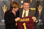 TEMPE, AZ - DECEMBER 14:  Head coach Todd Graham (R) of the Arizona State Sun Devil poses with Vice President for Athletics Lisa Love (L) at a press conference introducing him as the new head football coach at Sun Devil Stadium on December 14, 2011 in Tempe, Arizona.  (Photo by Christian Petersen/Getty Images)