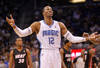 ORLANDO, FL - DECEMBER 21: Dwight Howard #12 of the Orlando Magic argues a call during a preseason game against the Miami Heat at Amway Center on December 21, 2011 in Orlando, Florida. NOTE TO USER: User expressly acknowledges and agrees that, by downloading and/or using this Photograph, User is consenting to the terms and conditions of the Getty Images License Agreement.  (Photo by Mike Ehrmann/Getty Images)