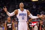 ORLANDO, FL - DECEMBER 21: Dwight Howard #12 of the Orlando Magic argues a call during a preseason game against the Miami Heat at Amway Center on December 21, 2011 in Orlando, Florida. NOTE TO USER: User expressly acknowledges and agrees that, by downloading and/or using this Photograph, User is consenting to the terms and conditions of the Getty Images License Agreement.  (Photo by Mike Ehrmann/Getty Images)