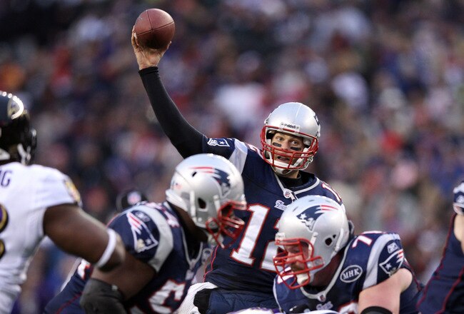 FOXBORO, MA - JANUARY 22:  Tom Brady #12 of the New England Patriots throws the ball against the Baltimore Ravens during their AFC Championship Game at Gillette Stadium on January 22, 2012 in Foxboro, Massachusetts.  (Photo by Elsa/Getty Images)