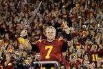 LOS ANGELES, CA - NOVEMBER 26:  Quarterback Matt Barkley #7 of the USC Trojans conducts the band after the game with the UCLA Bruins at the Los Angeles Memorial Coliseum on November 26, 2011 in Los Angeles, California. USC won 50-0.  (Photo by Stephen Dunn/Getty Images)