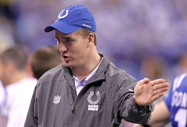 INDIANAPOLIS, IN - DECEMBER 22:  Peyton Manning  #18 of the Indianapolis Colts gives instructions to his teammates during the NFL against  the Houston Texans at Lucas Oil Stadium on December 22, 2011 in Indianapolis, Indiana.  (Photo by Andy Lyons/Getty Images)