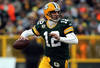 GREEN BAY, WI - JANUARY 15:  Aaron Rodgers #12 of the Green Bay Packers looks to pass against the New York Giants during their NFC Divisional playoff game at Lambeau Field on January 15, 2012 in Green Bay, Wisconsin.  (Photo by Jonathan Daniel/Getty Images)