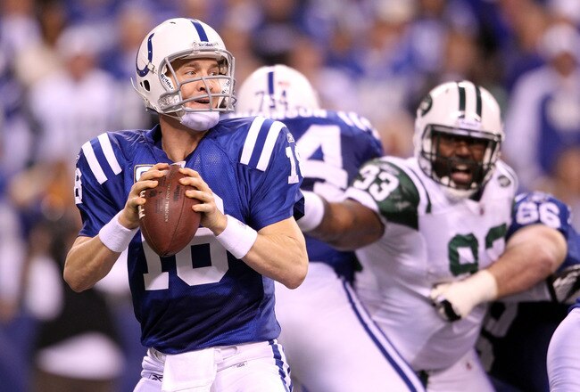 INDIANAPOLIS, IN - JANUARY 08:  Quarterback Peyton Manning #18 of the Indianapolis Colts looks to pass against the New York Jets during their 2011 AFC wild card playoff game at Lucas Oil Stadium on January 8, 2011 in Indianapolis, Indiana. The Jets won 17-16.  (Photo by Andy Lyons/Getty Images)