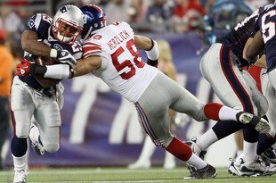 FOXBORO, MA - SEPTEMBER 01:  Mark Herzlich #58 of the New York Giants tackles Shane Vereen #29 of the New England Patriots  on September 1, 2011 at Gillette Stadium in Foxboro, Massachusetts.  (Photo by Elsa/Getty Images)