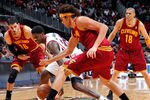 ATLANTA, GA - JANUARY 21:  Marvin Williams #24 of the Atlanta Hawks battles for a loose ball against Omri Casspi #36 and Anderson Varejao #17 of the Cleveland Cavaliers at Philips Arena on January 21, 2012 in Atlanta, Georgia.  NOTE TO USER: User expressly acknowledges and agrees that, by downloading and or using this photograph, User is consenting to the terms and conditions of the Getty Images License Agreement.  (Photo by Kevin C. Cox/Getty Images)