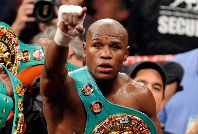 LAS VEGAS, NV - SEPTEMBER 17:  Floyd Mayweather Jr. celebrates after defeating Victor Ortiz by fourth round knockout during their WBC welterweight title fight at the MGM Grand Garden Arena on September 17, 2011 in Las Vegas, Nevada.  (Photo by Ethan Miller/Getty Images)