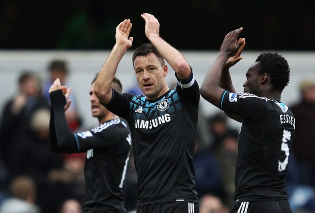 LONDON, ENGLAND - JANUARY 28:  John Terry of Chelsea celebrates victory after the FA Cup with Budweiser Fourth Round match between Queens Park Rangers and Chelsea at Loftus Road on January 28, 2012 in London, England.  (Photo by Clive Mason/Getty Images)
