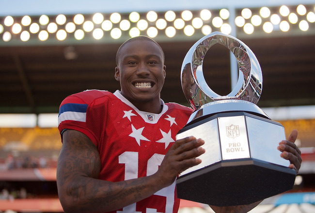 HONOLULU, HI - JANUARY 29:  Brandon Marshall #19 of the Miami Dolphins poses with the Most Valuable Player of the 2012 NFL Pro Bowl award at Aloha Stadium on January 29, 2012 in Honolulu, Hawaii.  (Photo by Kent Nishimura/Getty Images)