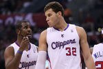 LOS ANGELES, CA - DECEMBER 30:  Chris Paul #3 and Blake Griffin #32 of the Los Angeles Clippers confer during hte game with the Chicago Bulls at Staples Center on December 30, 2011 in Los Angeles, California.  The Bulls won 114-101.  NOTE TO USER: User expressly acknowledges and agrees that, by downloading and or using this photograph, User is consenting to the terms and conditions of the Getty Images License Agreement.  (Photo by Stephen Dunn/Getty Images)