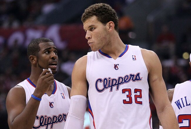 LOS ANGELES, CA - DECEMBER 30:  Chris Paul #3 and Blake Griffin #32 of the Los Angeles Clippers confer during hte game with the Chicago Bulls at Staples Center on December 30, 2011 in Los Angeles, California.  The Bulls won 114-101.  NOTE TO USER: User expressly acknowledges and agrees that, by downloading and or using this photograph, User is consenting to the terms and conditions of the Getty Images License Agreement.  (Photo by Stephen Dunn/Getty Images)