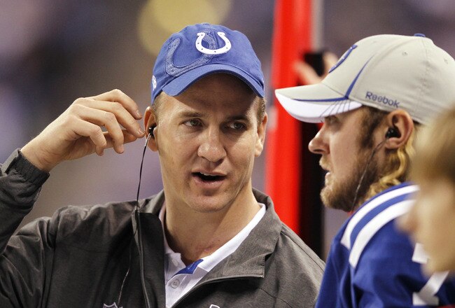 INDIANAPOLIS, IN - DECEMBER 22: Indianapolis Colts quarterback Peyton Manning looks on during the game against the Houston Texans at Lucas Oil Stadium on December 22, 2011 in Indianapolis, Indiana. The Colts defeated the Texans 19-16. (Photo by Joe Robbins/Getty Images)
