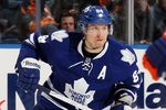 UNIONDALE, NY - JANUARY 24:  Mikhail Grabovski #84 of the Toronto Maple Leafs in action against the New York Islanders on January 24, 2012 at Nassau Coliseum in Uniondale, New York. The Maple Leafs defeated the Islanders 4-3 after overtime.  (Photo by Jim McIsaac/Getty Images)