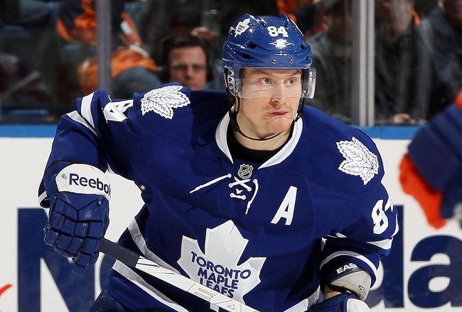 UNIONDALE, NY - JANUARY 24:  Mikhail Grabovski #84 of the Toronto Maple Leafs in action against the New York Islanders on January 24, 2012 at Nassau Coliseum in Uniondale, New York. The Maple Leafs defeated the Islanders 4-3 after overtime.  (Photo by Jim McIsaac/Getty Images)