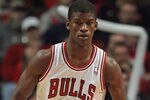 CHICAGO, IL - JANUARY 03:  Jimmy Butler #21 of the Chicago Bulls sets to defend against the Atlanta Hawks at the United Center on January 3, 2012 in Chicago, Illinois. The Bulls defeated the Hawks 76-74. NOTE TO USER: User expressly acknowledges and agrees that, by downloading and or using this photograph, User is consenting to the terms and conditions of the Getty Images License Agreement.  (Photo by Jonathan Daniel/Getty Images)