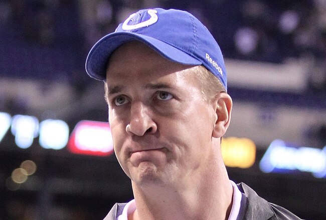INDIANAPOLIS, IN - DECEMBER 22:  Peyton Manning  #18 of the Indianapolis Colts celebrates after the final play of the Colts 19-16 victory over the Houston Texans in the NFL at Lucas Oil Stadium at Lucas Oil Stadium on December 22, 2011 in Indianapolis, Indiana.  (Photo by Andy Lyons/Getty Images)