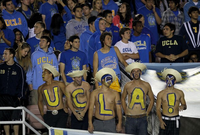 PASADENA, CA - OCTOBER 8: UCLA fans cheer during the game between the Washington State Cougars and the UCLA Bruins at the Rose Bowl on October 8, 2011 in Pasadena, California.   (Photo by Stephen Dunn/Getty Images)