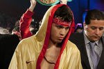 HOUSTON - NOVEMBER 19:  World Middleweight Champion Julio Chavez Jr. makes his way to the ring to defend his belt against Peter Manfredo Jr. at Reliant Arena at Reliant Park on November 19, 2011 in Houston, Texas.  (Photo by Bob Levey/Getty Images)