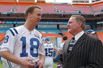Peyton Manning of the Indianapolis Colts, left, talks with team owner Jim Irsay during Media Day prior to Super Bowl XLI at Dolphins Stadium in Miami, Florida on January 30, 2007. (Photo by A. Messerschmidt/Getty Images)
