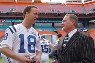 Peyton Manning of the Indianapolis Colts, left, talks with team owner Jim Irsay during Media Day prior to Super Bowl XLI at Dolphins Stadium in Miami, Florida on January 30, 2007. (Photo by A. Messerschmidt/Getty Images)