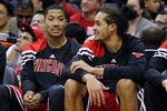 WASHINGTON, DC - JANUARY 30: Derrick Rose #1 (L) talks with teammate Joakim Noah #13 of the Chicago BuJoakim NDerrick Rose (R) during the second half against the Washington Wizards at Verizon Center on January 30, 2012 in Washington, DC. NOTE TO USER: User expressly acknowledges and agrees that, by downloading and or using this photograph, User is consenting to the terms and conditions of the Getty Images License Agreement.  (Photo by Rob Carr/Getty Images)