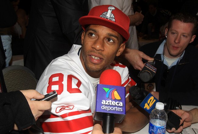 INDIANAPOLIS, IN - FEBRUARY 02:  Victor Cruz #80 of the New York Giants answers questions from the press during a media availability session for Super Bowl XLVI at the Indianapolis Downtown Marriott on February 2, 2012 in Indianapolis, Indiana.  (Photo by Scott Halleran/Getty Images)