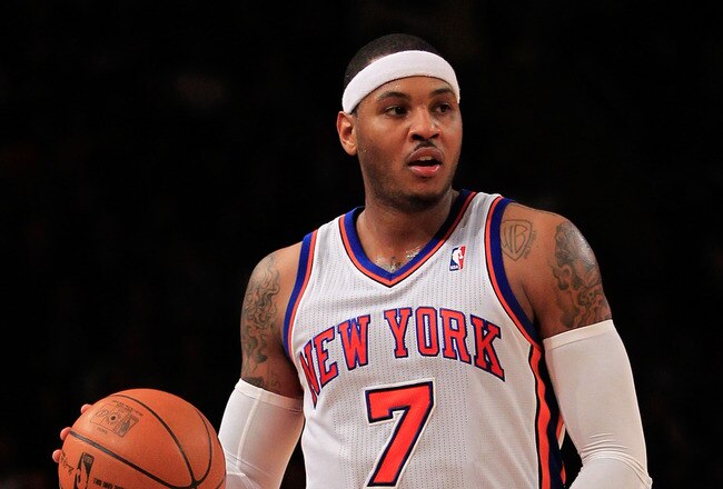 NEW YORK, NY - JANUARY 09: Carmelo Anthony #7 of the New York Knicks dribbles against the Charlotte Bobcats at Madison Square Garden on January 9, 2012 in New York City. NOTE TO USER: User expressly acknowledges and agrees that, by downloading and or using this photograph, User is consenting to the terms and conditions of the Getty Images License Agreement.  (Photo by Chris Trotman/Getty Images)
