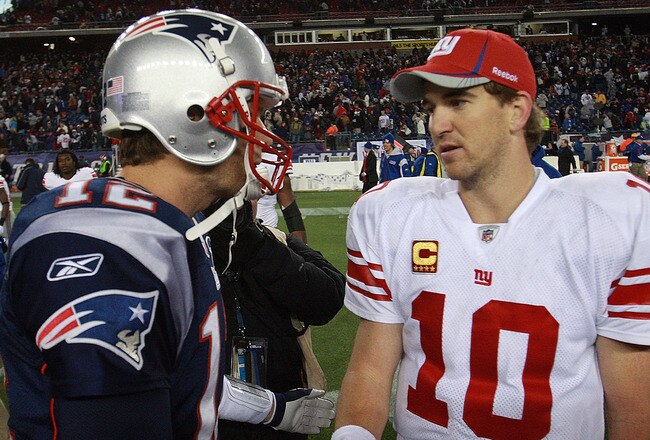 FOXBORO, MA - NOVEMBER 6:    Tom Brady #12 of the New England Patriots congratulates  Eli Manning #10 of the New York Giants after the New York Giants 24-20 win on November 6, 2011 in Foxboro, Massachusetts. (Photo by Jim Rogash/Getty Images)
