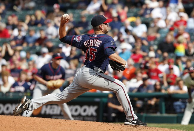 CLEVELAND, OH - SEPTEMBER 25: Glen Perkins #15 of the Minnesota Twins pitches against the Cleveland Indians during the eighth inning of their game on September 25, 2011 at Progressive Field in Cleveland, Ohio. The Twins defeated theIndians 6-4. (Photo by David Maxwell/Getty Images)