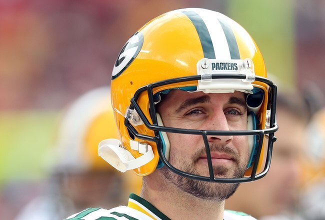 KANSAS CITY, MO - DECEMBER 18:  Quarterback Aaron Rodgers #12 of the Green Bay Packers in action during the game against the Kansas City Chiefs on December 18, 2011 at Arrowhead Stadium in Kansas City, Missouri.  (Photo by Jamie Squire/Getty Images)