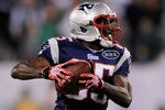 EAST RUTHERFORD, NJ - NOVEMBER 13:   Chad Ochocinco #85 of the New England Patriots runs with the ball at MetLife Stadium on November 13, 2011 in East Rutherford, New Jersey.  (Photo by Patrick McDermott/Getty Images)
