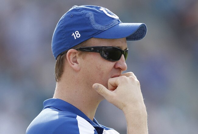 JACKSONVILLE, FL - JANUARY 1: Quarterback Peyton Manning of the Indianapolis Colts looks on during the game against the Jacksonville Jaguars at EverBank Field on January 1, 2012 in Jacksonville, Florida. The Jaguars defeated the Colts 19-13. (Photo by Joe Robbins/Getty Images)