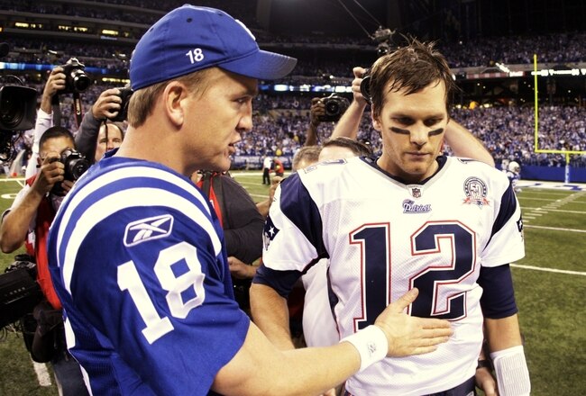 INDIANAPOLIS - NOVEMBER 15:  Quarterback Peyton Manning #18 of the Indianapolis Colts greets Tom Brady #12 of the New England Patriots after the game at Lucas Oil Stadium on November 15, 2009 in Indianapolis, Indiana.  The Colts won the game 35-34. (Photo by Jamie Squire/Getty Images)
