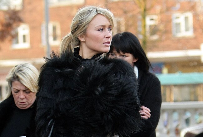 SOUTHPORT, ENGLAND - DECEMBER 29:  Alex Curran, wife of footballer Steven Gerrard, walks near the police station where her husband has been questioned by police on December 29, 2008 in Southport, England. It is alleged Steven Gerrard was arrested after an incident in a nightclub on Bold Street on December 28, in which an assault is reported to have taken place. The Liverpool player and five other men remain in custody.  (Photo by Christopher Furlong/Getty Images)
