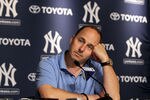 NEW YORK, NY - JULY 08:  General manager Brian Cashman of the New York Yankees speaks to the media after the game against the Tampa Bay Rays was postponed due to rain on July 8, 2011 at Yankee Stadium in the Bronx borough of New York City.  (Photo by Jim McIsaac/Getty Images)