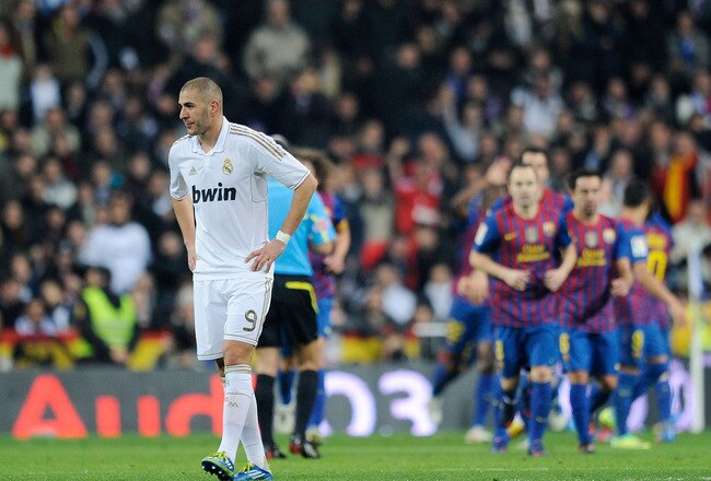MADRID, SPAIN - JANUARY 18:  Karim Benzema of Real Madrid reacts after Barcelona scored their 2nd goal during the Copa del Rey Quarter Finals match between Real Madrid and Barcelona at Estadio Santiago Bernabeu on January 18, 2012 in Madrid, Spain.  (Photo by Denis Doyle/Getty Images)