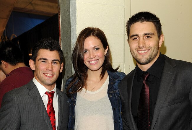 ANAHEIM, CA - NOVEMBER 12:  (L-R) Mixed martial arts fighter Dominick Cruz, actress Mandy Moore and mixed martial arts fighter Carlos Condit attend UFC on Fox:  Live Heavyweight Championship at the Honda Center on November 12, 2011 in Anaheim, California.  (Photo by Jason Merritt/Getty Images)