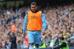 MANCHESTER, ENGLAND - SEPTEMBER 24:  Carlos Tevez of Manchester City looks on from the sidelines during the Barclays Premier League match between Manchester City and Everton at the Etihad Stadium on September 24, 2011 in Manchester, England.  (Photo by Michael Regan/Getty Images)