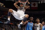 DENVER, CO - APRIL 23:  Kenyon Martin #4 of the Denver Nuggets dunks the ball as Nazr Mohammed #8 of the Oklahoma City Thunder, Wilson Chandler #21 of the Denver Nuggets and Kevin Durant #35 of the Oklahoma City Thunder look on in Game Three of the Western Conference Quarterfinals in the 2011 NBA Playoffs on April 23, 2011 at the Pepsi Center in Denver, Colorado. NOTE TO USER: User expressly acknowledges and agrees that, by downloading and or using this photograph, User is consenting to the terms and conditions of the Getty Images License Agreement.  (Photo by Doug Pensinger/Getty Images)