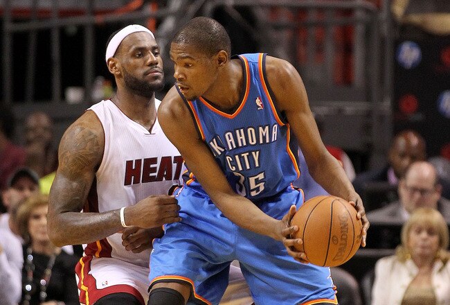 MIAMI, FL - MARCH 16:  LeBron James #6 of the Miami Heat guards Kevin Durant #35 of the Oklahoma City Thunder during a game at American Airlines Arena on March 16, 2011 in Miami, Florida. NOTE TO USER: User expressly acknowledges and agrees that, by downloading and/or using this Photograph, User is consenting to the terms and conditions of the Getty Images License Agreement.  (Photo by Mike Ehrmann/Getty Images)