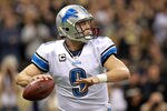 NEW ORLEANS, LA - JANUARY 07:  Matthew Stafford #9 of the Detroit Lions drops back to pass against the New Orleans Saints during their 2012 NFC Wild Card Playoff game at Mercedes-Benz Superdome on January 7, 2012 in New Orleans, Louisiana.  (Photo by Ronald Martinez/Getty Images)
