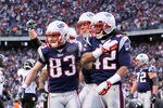 FOXBORO, MA - JANUARY 22:   Wes Welker #83 of the New England Patriots congratulates teammate BenJarvus Green-Ellis #42 after scoring a touchdown in the second quarter against the Baltimore Ravens during their AFC Championship Game at Gillette Stadium on January 22, 2012 in Foxboro, Massachusetts.  (Photo by Elsa/Getty Images)
