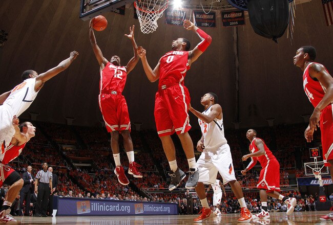 CHAMPAIGN, IL - JANUARY 10: Sam Thompson #12 and Jared Sullinger #0 of the Ohio State Buckeyes rebound against the Illinois Fighting Illini during first half action at Assembly Hall on January 10, 2012 in Champaign, Illinois. (Photo by Joe Robbins/Getty Images)