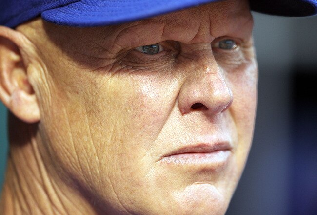 CINCINNATI, OH - SEPTEMBER 14:  Mike Quade the manager of the Chicago Cubs watches the action during the game against the Cincinnati Reds at Great American Ball Park on September 14, 2011 in Cincinnati, Ohio.  (Photo by Andy Lyons/Getty Images)